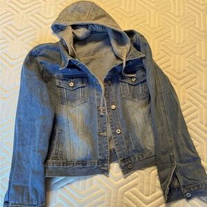 Women’s oversized jean jacket with removable hood.
